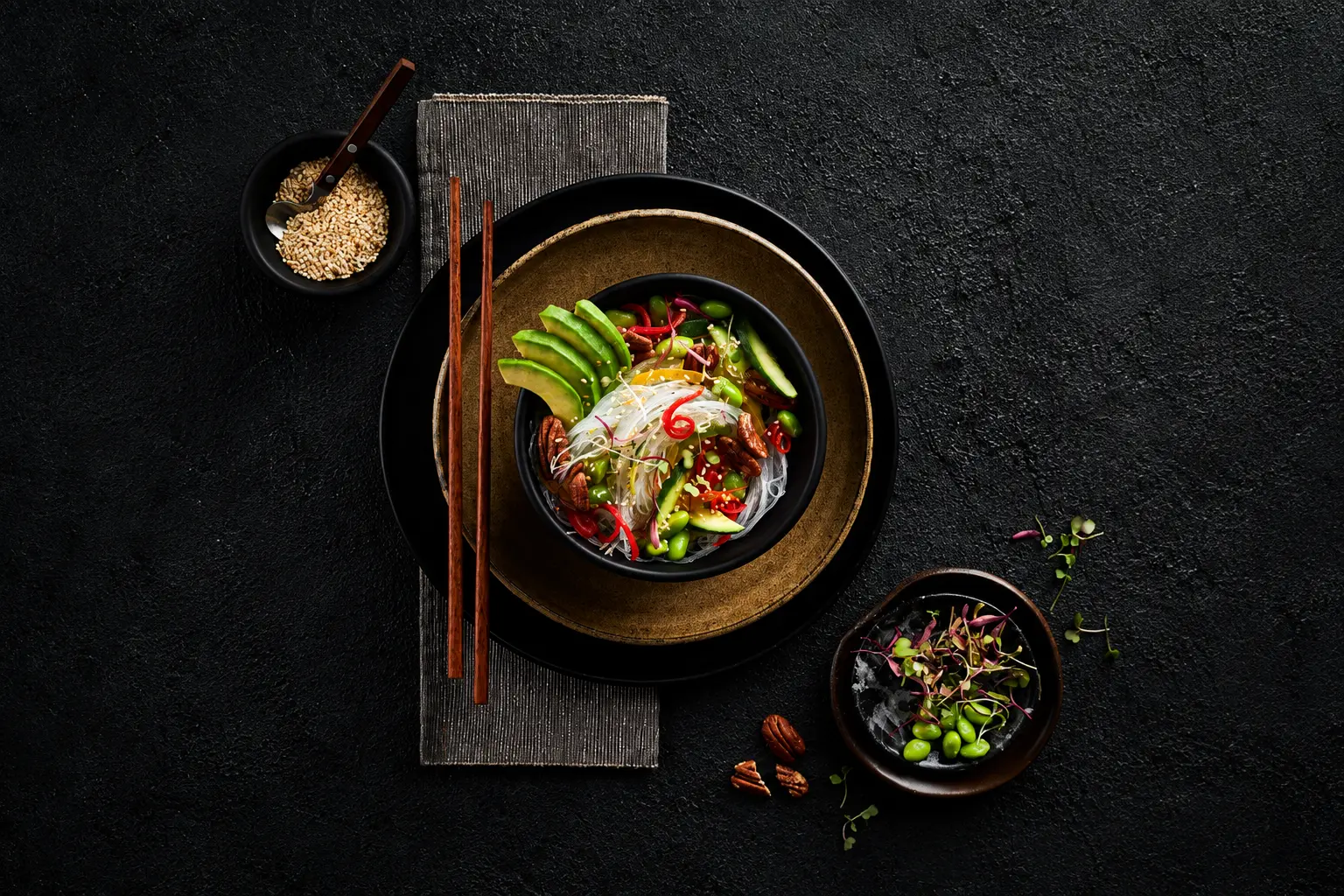 Premium Asian dish arranged on dark tableware